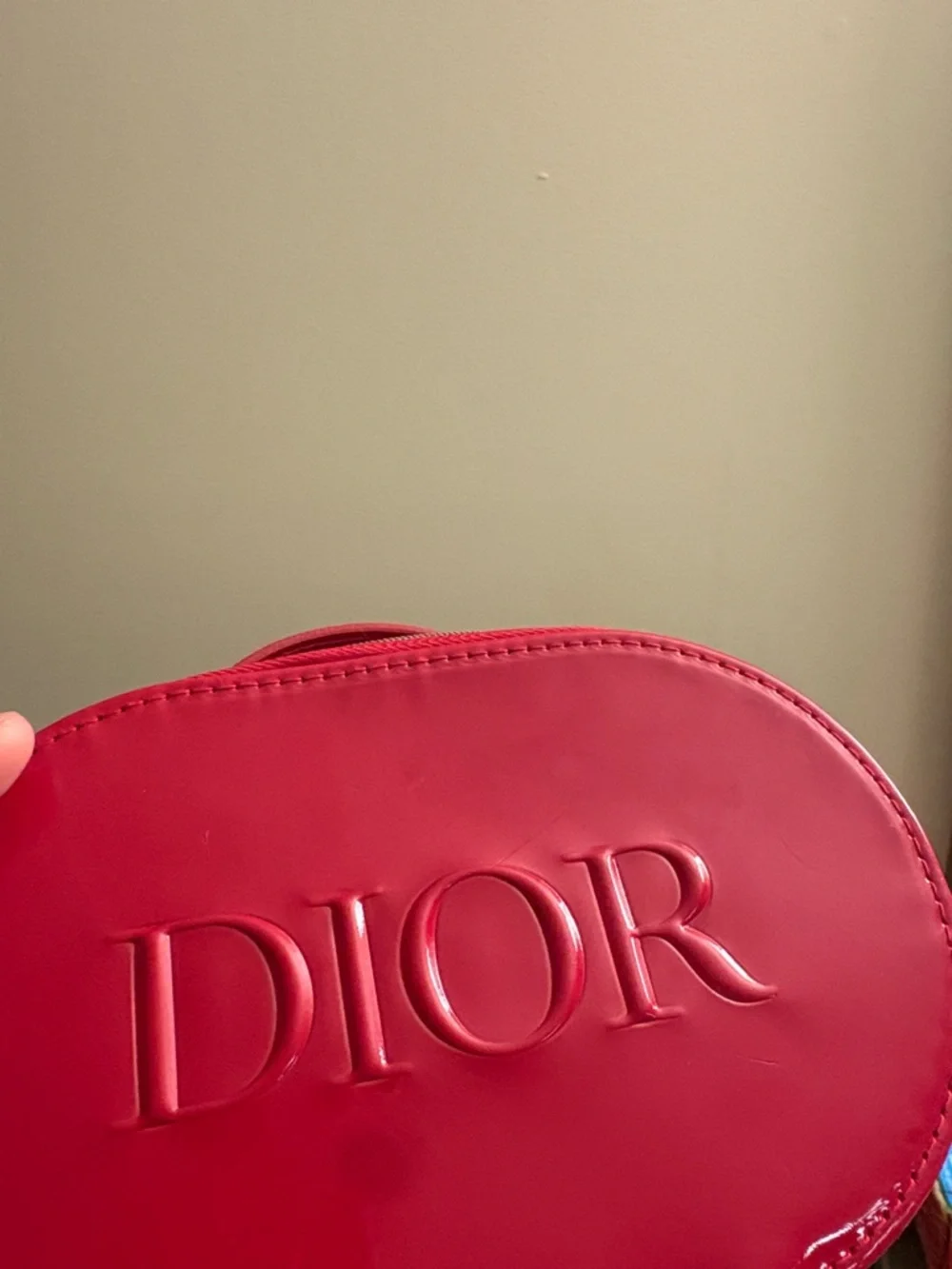 Dior Red Patent Oval Cosmetic Case with Embossed Logo